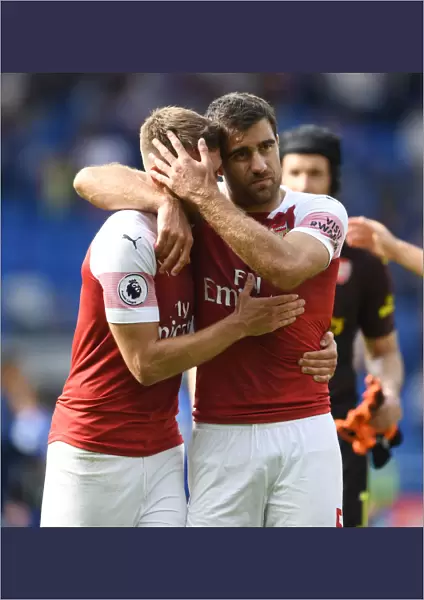 Arsenal's Aaron Ramsey and Sokratis Celebrate Victory Over Cardiff City
