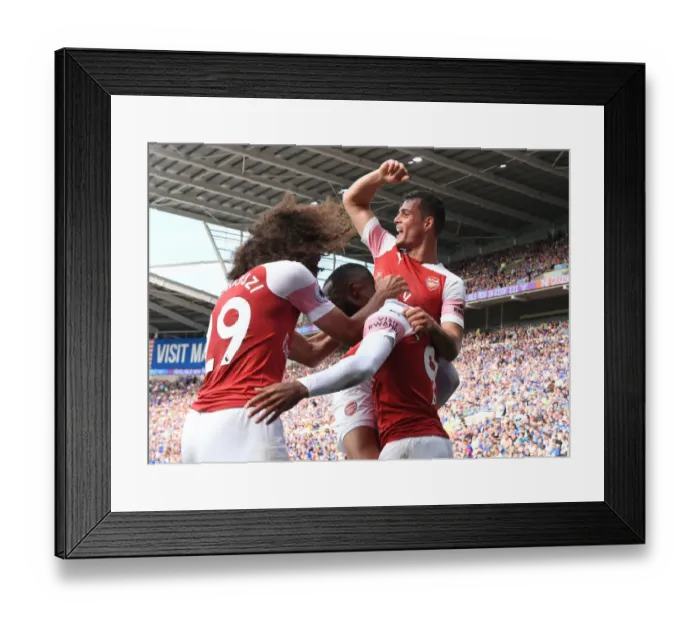 Framed Print : Arsenal's Xhaka, Lacazette, and Guendouzi Celebrate Goals Against Cardiff City Framed Print : Arsenal's Xhaka, Lacazette, and Guendouzi Celebrate Goals Against Cardiff City