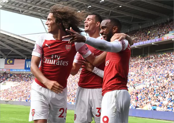 Arsenal's Unforgettable Moment: Aubameyang's Double Against Cardiff City - Guendouzi, Xhaka, Lacazette Celebrate