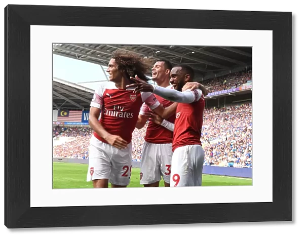 Arsenal's Unforgettable Moment: Aubameyang's Double Against Cardiff City - Guendouzi, Xhaka, Lacazette Celebrate