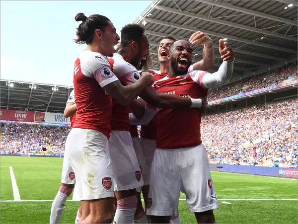 Arsenal's Aubameyang, Bellerin, and Lacazette Celebrate Goals Against Cardiff City