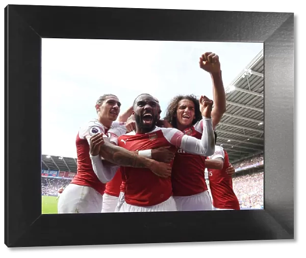 Arsenal's Celebrating Trio: Aubameyang, Lacazette, and Guendouzi at Cardiff City Stadium