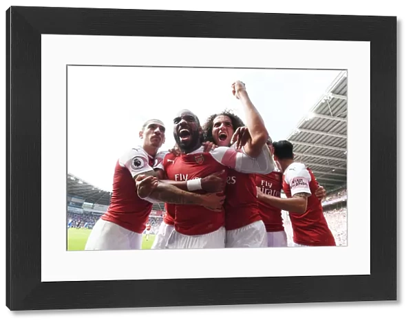 Arsenal's Unstoppable Moment: Lacazette, Bellerin, Guendouzi Celebrate Thrilling Goal Against Cardiff City