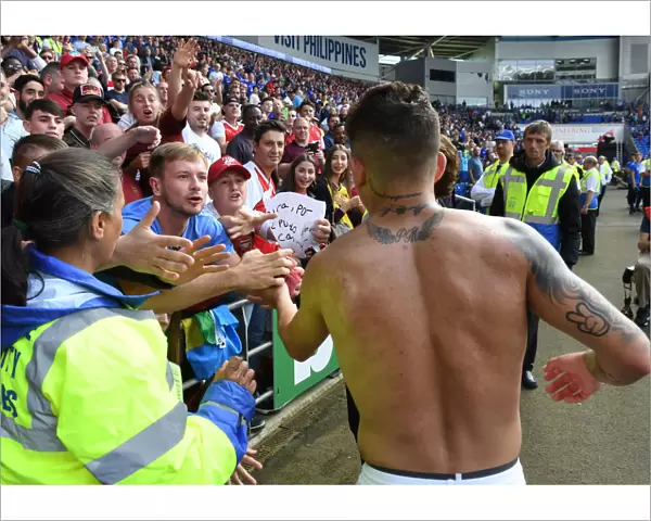 Lucas Torreira's Heartfelt Shirt Donation to Grateful Arsenal Fan after Cardiff Match