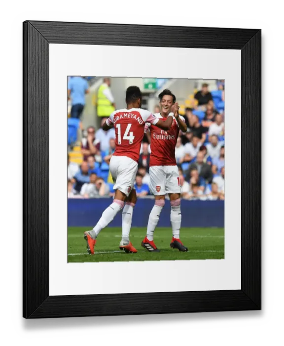 Framed Print : Aubameyang and Ozil Celebrate Arsenal's Winning Goals vs Cardiff City Framed Print : Aubameyang and Ozil Celebrate Arsenal's Winning Goals vs Cardiff City