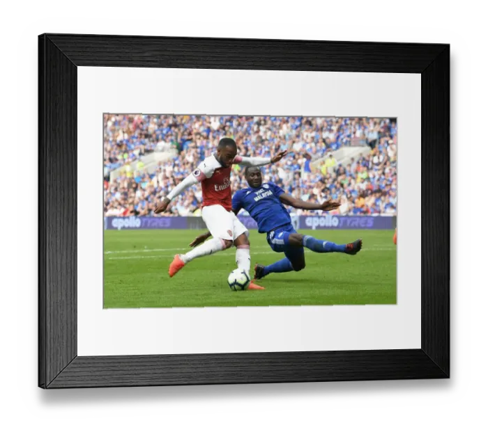 Framed Print : Alexandre Lacazette Scores Dramatic Goal Past Sol Bamba in Cardiff Derby Framed Print : Alexandre Lacazette Scores Dramatic Goal Past Sol Bamba in Cardiff Derby