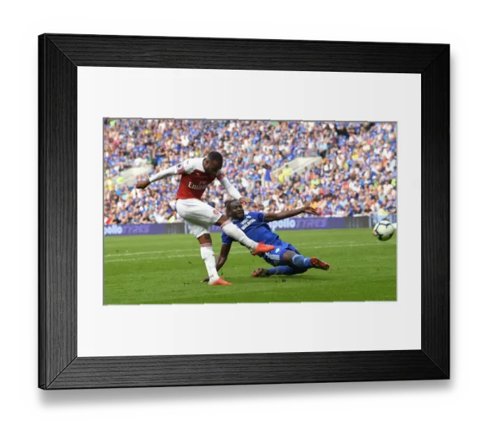 Framed Print : Alexandre Lacazette's Dramatic Goal Past Sol Bamba in the Cardiff Derby Framed Print : Alexandre Lacazette's Dramatic Goal Past Sol Bamba in the Cardiff Derby