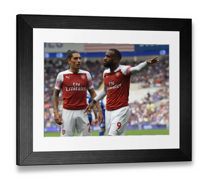 Framed Print : Arsenal's Lacazette and Bellerin: Triumphant Moment after Scoring Third Goal vs. Cardiff City Framed Print : Arsenal's Lacazette and Bellerin: Triumphant Moment after Scoring Third Goal vs. Cardiff City