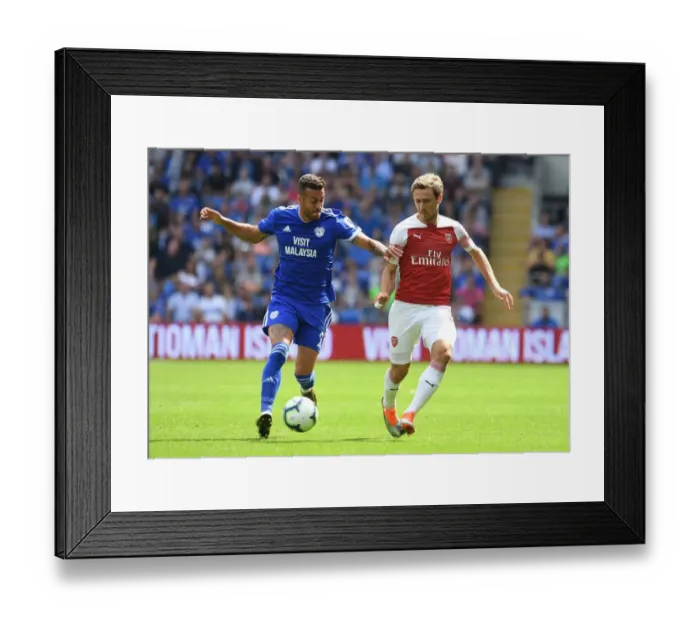 Framed Print : Monreal and Ozil Clash: Cardiff City vs. Arsenal FC, Premier League 2018-19 Framed Print : Monreal and Ozil Clash: Cardiff City vs. Arsenal FC, Premier League 2018-19