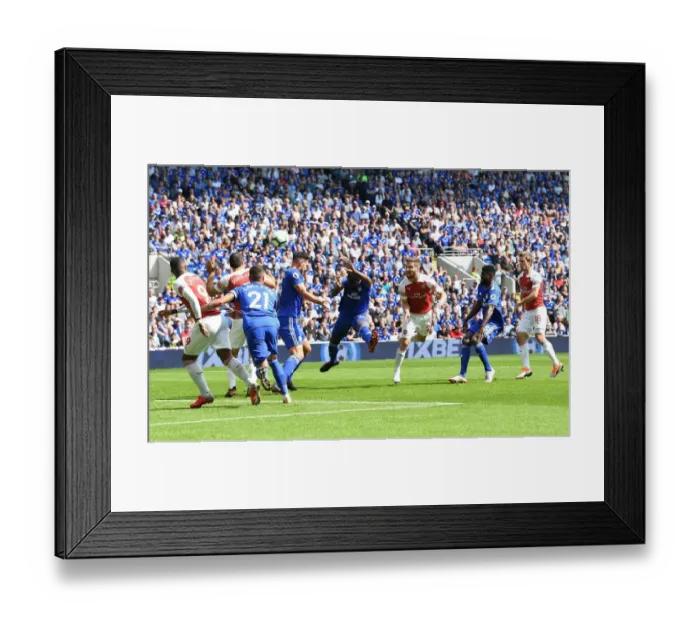 Framed Print : Mustafi Scores the Winner: Arsenal's Triumph Over Cardiff City in Premier League 2018-19