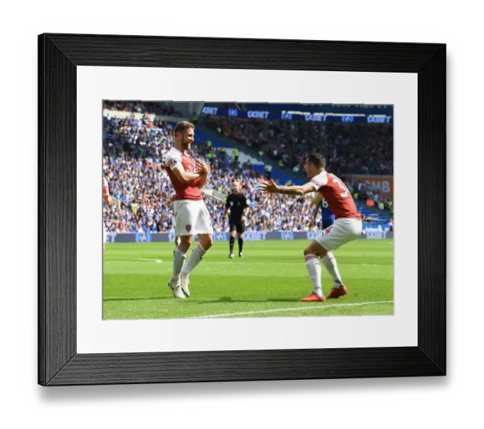 Framed Print : Mustafi and Xhaka in Unison: Arsenal's Goal Celebration vs. Cardiff City, 2018-19 Premier League Framed Print : Mustafi and Xhaka in Unison: Arsenal's Goal Celebration vs. Cardiff City, 2018-19 Premier League
