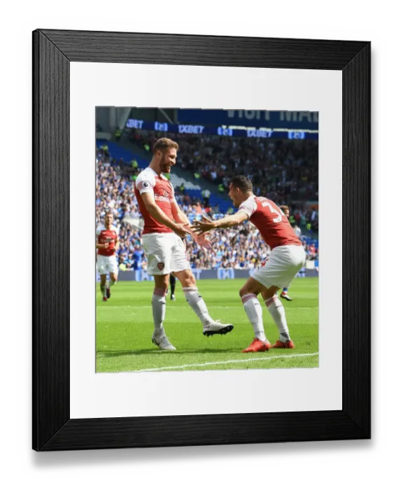 Framed Print : Arsenal's Unified Goal: Mustafi and Xhaka Celebrate at Cardiff City, 2018-19