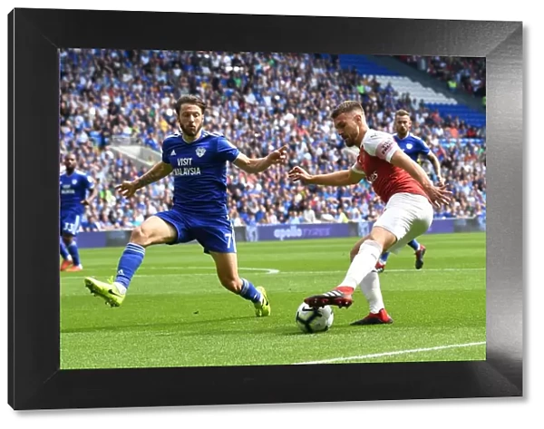 Clash of Midfield Titans: Ramsey vs. Arter in the Intense Cardiff Derby, Premier League 2018-19