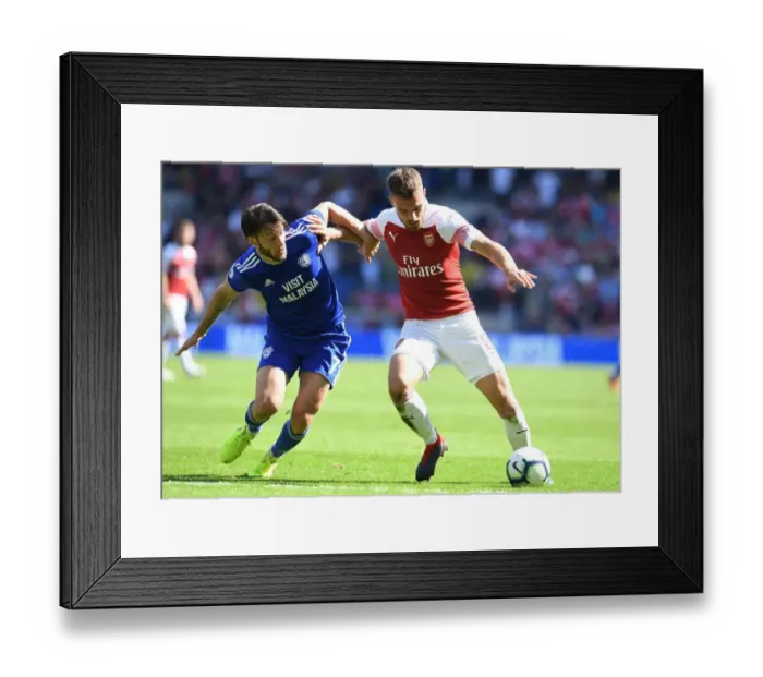 Framed Print : Clash at Cardiff: Ramsey vs. Arter in Premier League Battle Framed Print : Clash at Cardiff: Ramsey vs. Arter in Premier League Battle