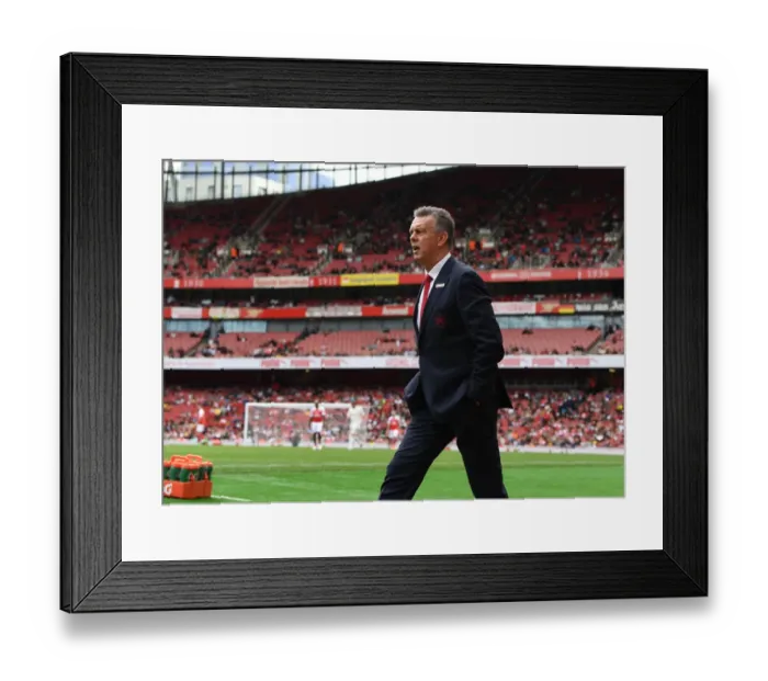 Framed Print : Arsenal Legends vs Real Madrid Legends: A Clash of Football Greats - David O'Leary at the Helm