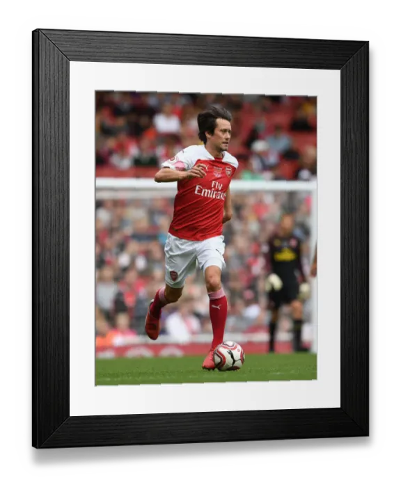 Framed Print : Arsenal Legends vs Real Madrid Legends: A Clash of Football Icons - Rosicky's Glorious Moment Framed Print : Arsenal Legends vs Real Madrid Legends: A Clash of Football Icons - Rosicky's Glorious Moment
