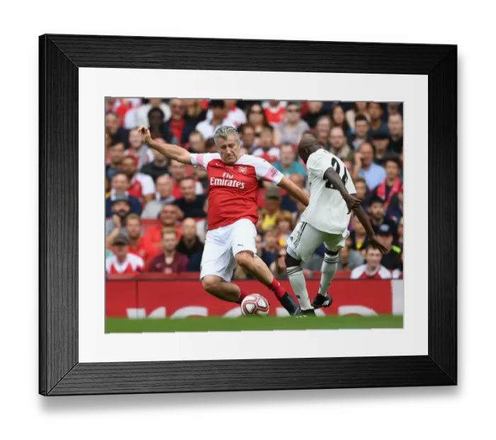 Framed Print : Arsenal Legends vs Real Madrid Legends: A Clash of Football Greats - Suker vs Makelele: A Legendary Rivalry Relived Framed Print : Arsenal Legends vs Real Madrid Legends: A Clash of Football Greats - Suker vs Makelele: A Legendary Rivalry Relived
