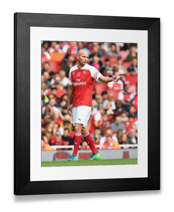 Framed Print : A Clash of Football Legends: Pascal Cygan's Glorious Performance for Arsenal vs Real Madrid Framed Print : A Clash of Football Legends: Pascal Cygan's Glorious Performance for Arsenal vs Real Madrid