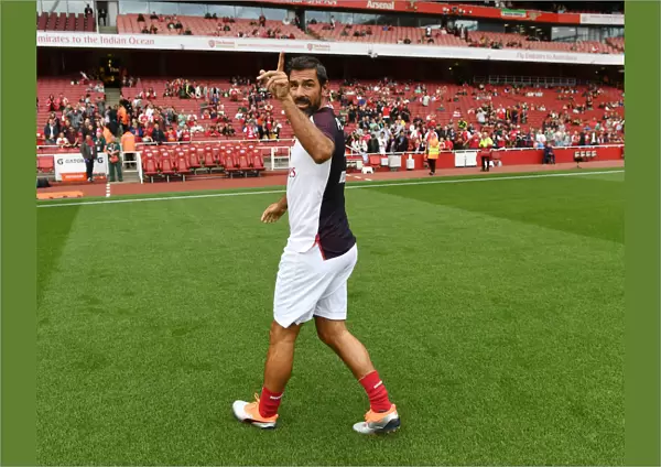 Clash of Footballing Icons: Robert Pires for Arsenal vs Real Madrid Legends