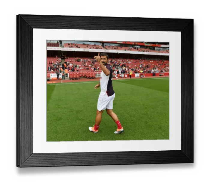 Framed Print : Clash of Footballing Icons: Robert Pires for Arsenal vs Real Madrid Legends