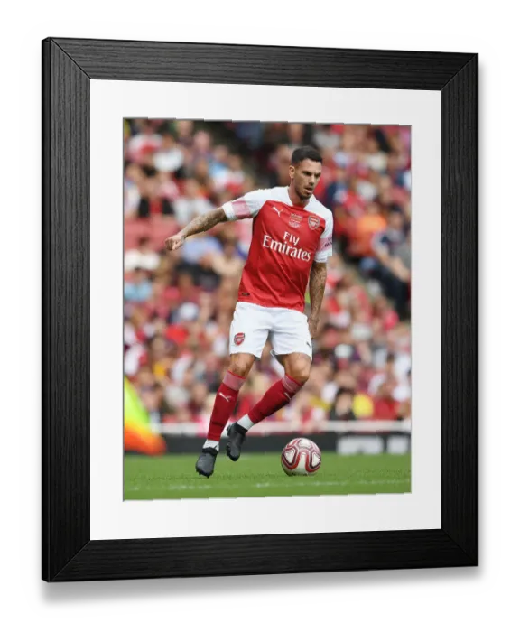 Framed Print : Jeremie Aliadiere Shines in Arsenal Legends vs. Real Madrid Legends Clash: A Battle of Football Greats