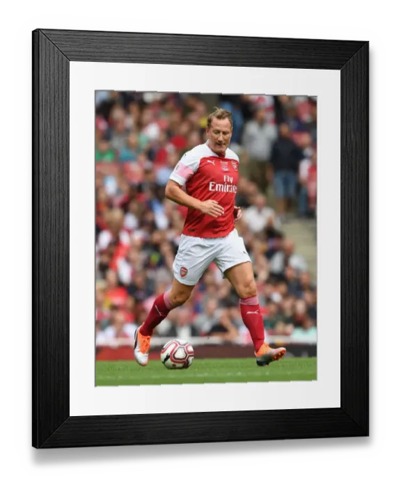 Framed Print : Arsenal Legends vs Real Madrid Legends: Clash of Football Greats - Ray Parlour in Action Framed Print : Arsenal Legends vs Real Madrid Legends: Clash of Football Greats - Ray Parlour in Action