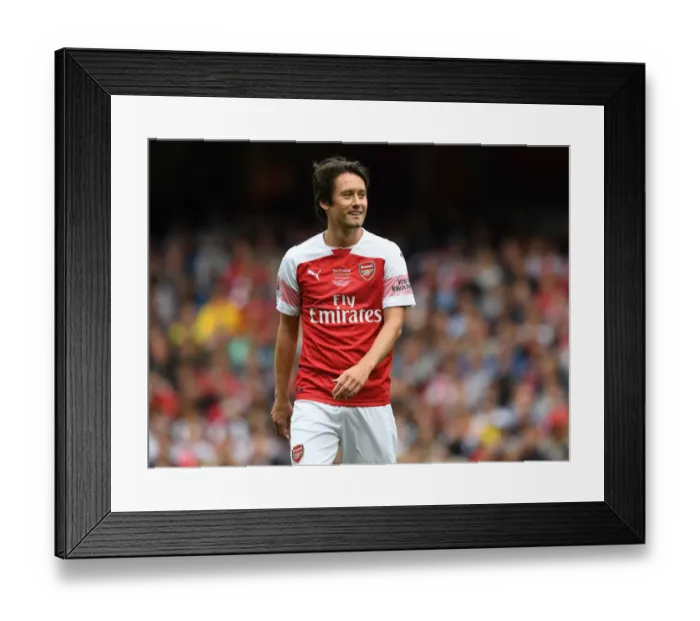 Framed Print : Arsenal Legends vs Real Madrid Legends: Rosicky's Shining Performance at Emirates Stadium