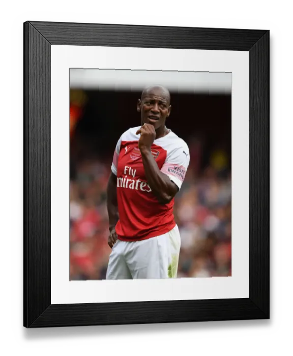 Framed Print : Arsenal Legends vs Real Madrid Legends: A Football Clash - Luis Boa Morte Framed Print : Arsenal Legends vs Real Madrid Legends: A Football Clash - Luis Boa Morte