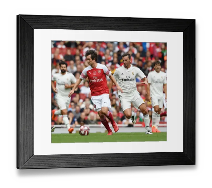 Framed Print : Rosicky's Magic: Arsenal Legends vs Real Madrid Legends - Rosicky Dazzles Past Pavon Framed Print : Rosicky's Magic: Arsenal Legends vs Real Madrid Legends - Rosicky Dazzles Past Pavon