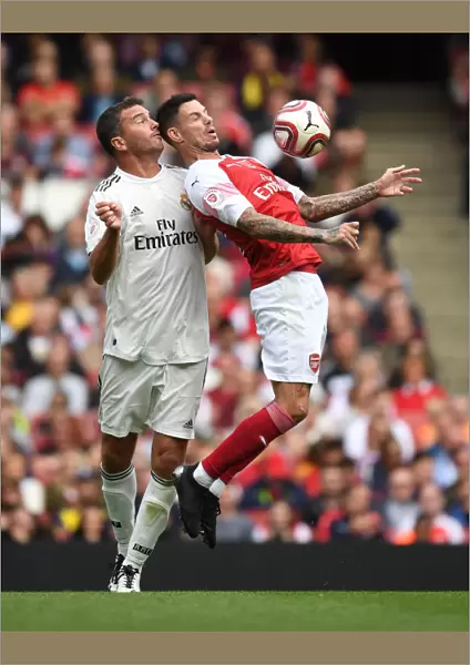 Clash of Football Legends: Aliadiere vs Pavon - Arsenal vs Real Madrid