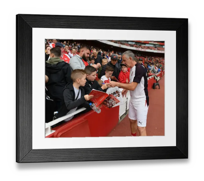 Framed Print : Arsenal Legends vs Real Madrid Legends: Nigel Winterburn Interacts with Fans at Emirates Stadium
