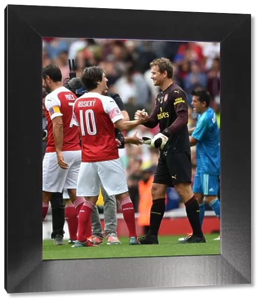 Arsenal Legends: Jens Lehmann and Tomas Rosicky Reunite on the Emirates Field against Real Madrid Legends