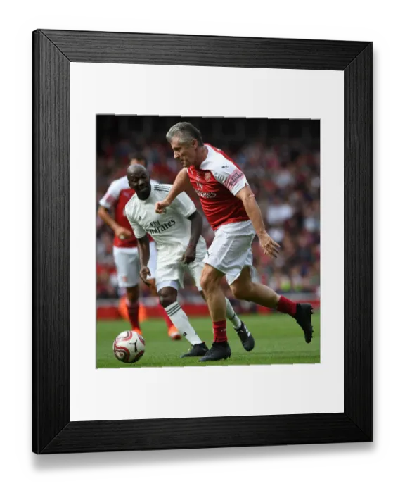 Framed Print : Davor Sukur Shines: Arsenal Legends vs Real Madrid Legends Showdown