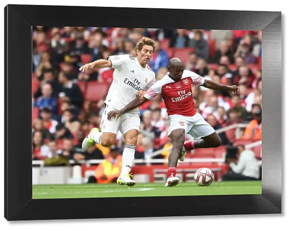 A Clash of Football Greats: Luis Boa Morte Shines for Arsenal Legends vs Real Madrid Legends (2018-19)