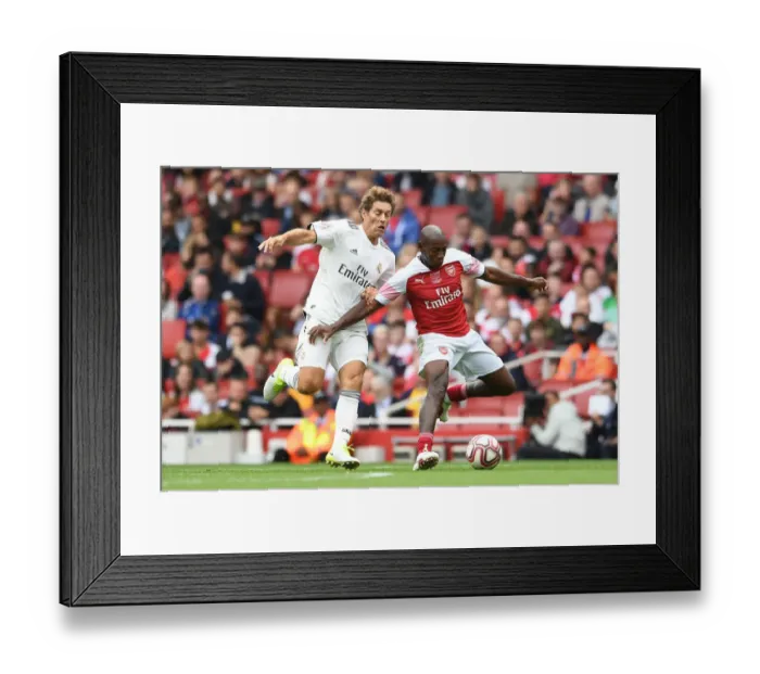 Framed Print : A Clash of Football Greats: Luis Boa Morte Shines for Arsenal Legends vs Real Madrid Legends (2018-19) Framed Print : A Clash of Football Greats: Luis Boa Morte Shines for Arsenal Legends vs Real Madrid Legends (2018-19)