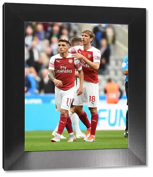 Arsenal's Lucas Torreira and Nacho Monreal Celebrate after Newcastle United Match, 2018-19 Premier League