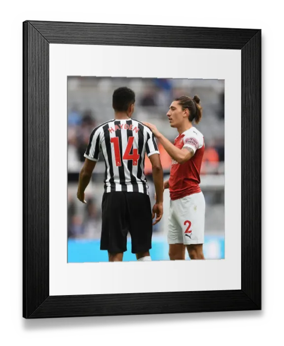 Framed Print : Sportsmanship Prevails: Heartfelt Chat Between Bellerin and Hayden Amidst Newcastle-Arsenal Rivalry