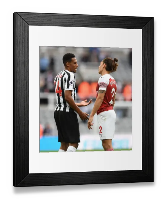 Framed Print : Sportsmanship Shines: Heartwarming Post-Match Chat Between Bellerin and Hayden Amidst Newcastle-Arsenal Rivalry (2018-19)