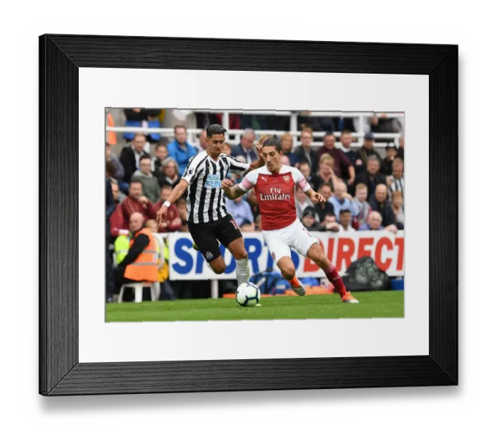 Framed Print : Bellerin vs Perez: A Premier League Showdown at St. James Park Framed Print : Bellerin vs Perez: A Premier League Showdown at St. James Park