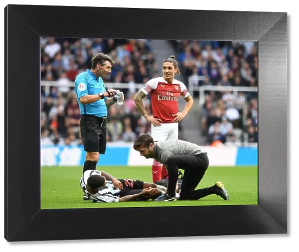 Hector Bellerin Confronts Referee Lee Probert During Newcastle vs. Arsenal Premier League Clash