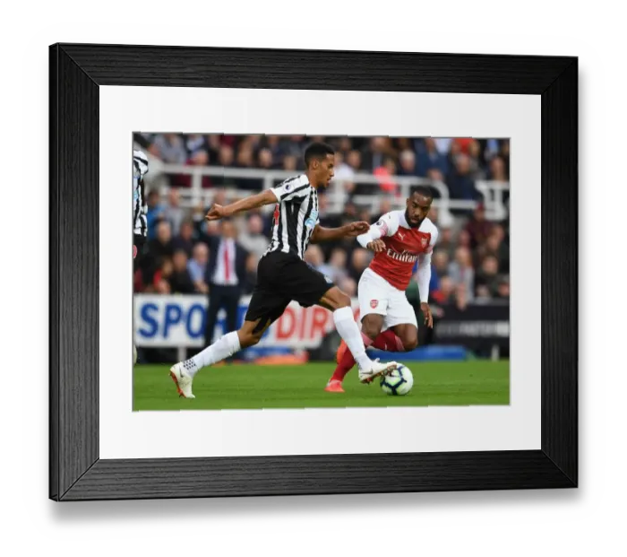 Framed Print : Clash at St. James Park: Lacazette vs. Hayden