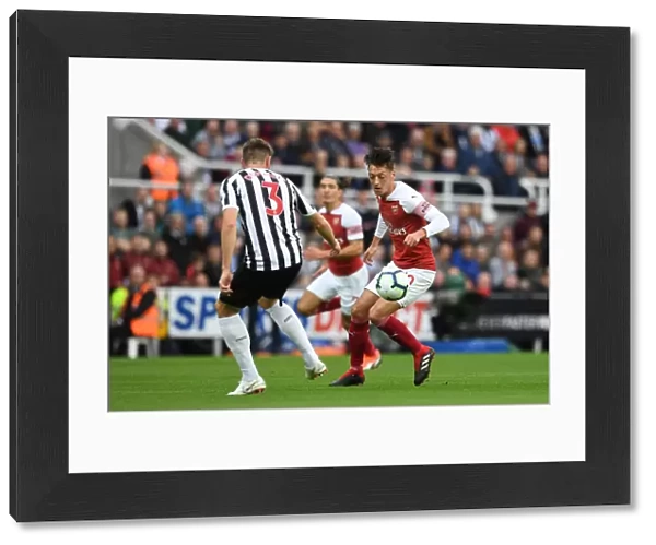 Mesut Ozil and Paul Dummett Clash in Intense Arsenal Victory over Newcastle United at St. James Park (1:2)