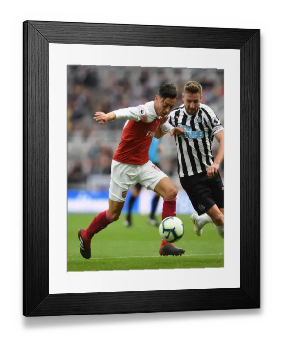 Framed Print : Mesut Ozil (Arsenal) Paul Dummett (Newcastle) Framed Print : Mesut Ozil (Arsenal) Paul Dummett (Newcastle)