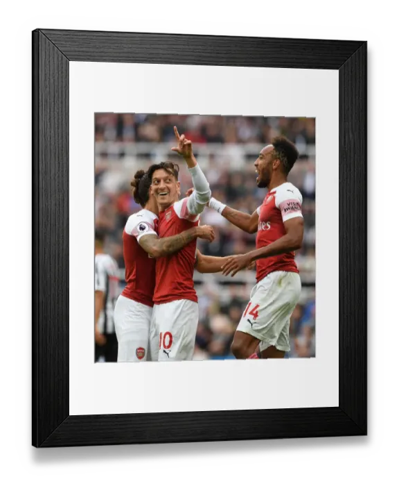 Framed Print : Mesut Ozil, Hector Bellerin, and Pierre-Emerick Aubameyang Celebrate Arsenal's Goals Against Newcastle United Framed Print : Mesut Ozil, Hector Bellerin, and Pierre-Emerick Aubameyang Celebrate Arsenal's Goals Against Newcastle United