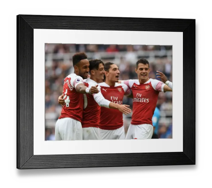 Framed Print : Arsenal's Ozil, Bellerin, Aubameyang, and Xhaka Celebrate Goals Against Newcastle United