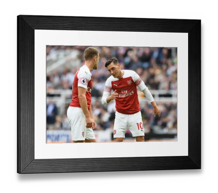 Framed Print : Mesut Ozil and Aaron Ramsey in Deep Conversation: Newcastle United vs. Arsenal FC, 2018-19 Premier League