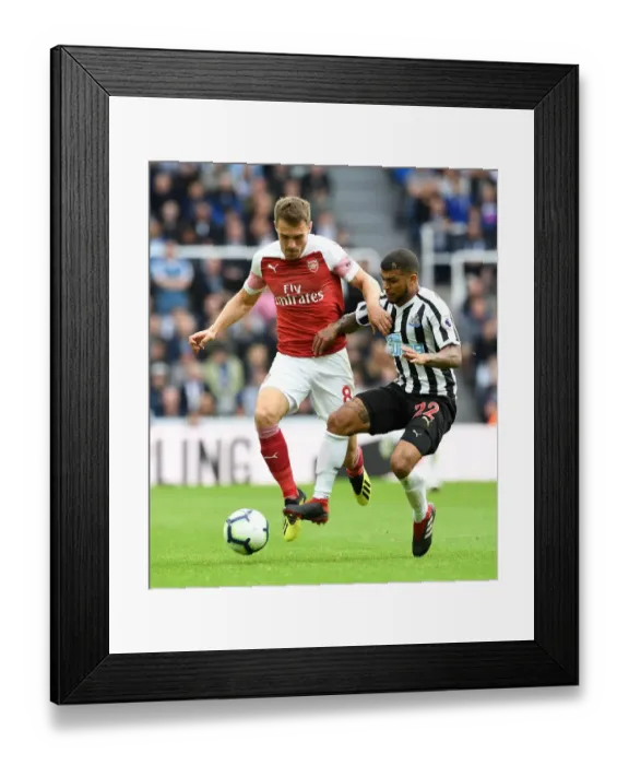 Framed Print : Ramsey vs. Kenedy: A Premier League Showdown at St. James Park (September 2018)
