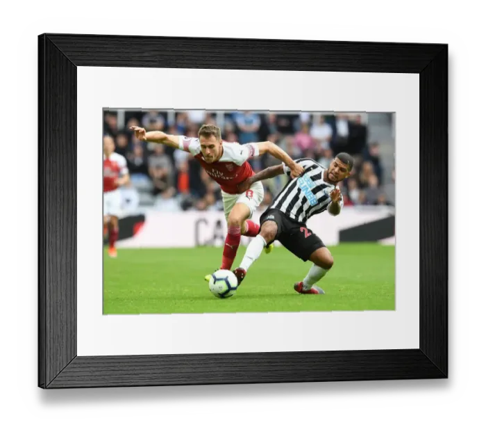 Framed Print : Clash at St. James Park: A Battle Between Ramsey and Kenedy - Arsenal vs. Newcastle United, Premier League 2018 / 19 Framed Print : Clash at St. James Park: A Battle Between Ramsey and Kenedy - Arsenal vs. Newcastle United, Premier League 2018 / 19