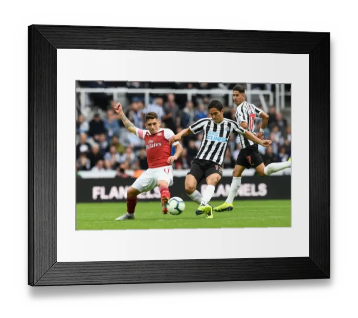 Framed Print : Torreira vs Muto: Intense Battle in Newcastle United vs Arsenal FC Premier League Clash