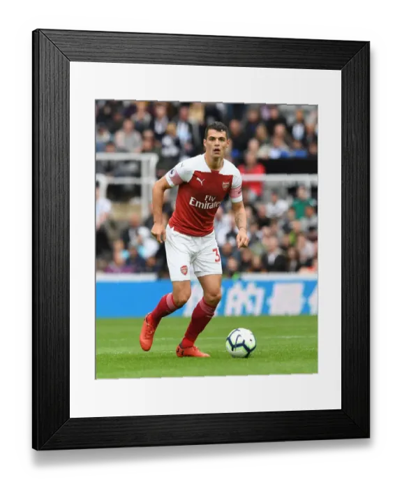 Framed Print : Granit Xhaka: Arsenal's Midfield Maestro Shines Against Newcastle United, Premier League 2018-19